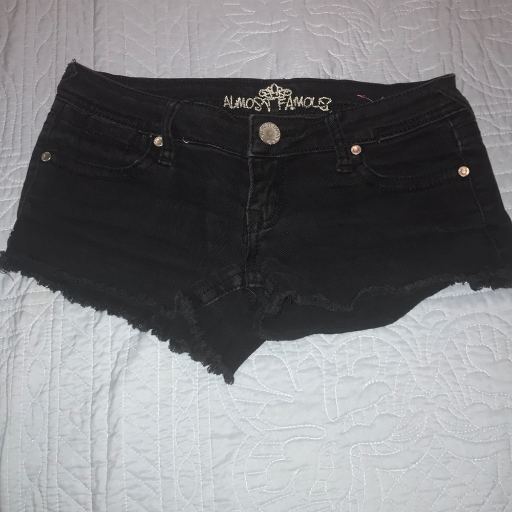 Black frayed denim shorts